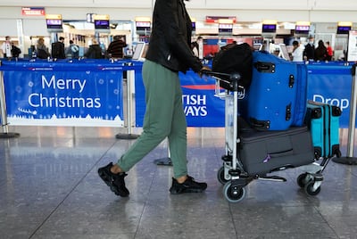 A passenger walking through Heathrow Airport. Bloomberg