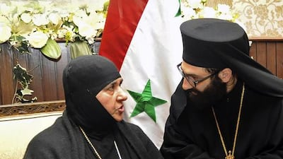 More than a dozen Greek Orthodox nuns were finally released on Monday, March 10, 2014, after being held by anti Assad regime rebels in Syria for four months. They were exchanged for rebel women prisoners held in government jails. AP Photo / SANA
