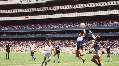 Diego Maradona scores his infamous 'Hand of God' goal against England at the 1986 World Cup. Getty Images