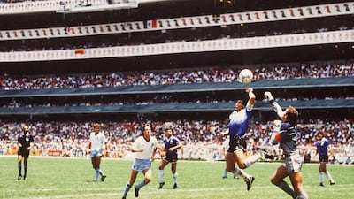 Diego Maradona scores his infamous 'Hand of God' goal against England at the 1986 World Cup. Getty Images