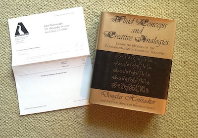 'Fluid Concepts and Creative Analogies Computer Models of the Fundamental Mechanisms of Thought', the first ever book sold on Amazon, and the 1995 receipt issued to its buyer, John Wainwright. Photo: John Wainwright