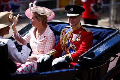 Prince Edward, Earl of Wessex, and Sophie, Countess of Wessex, ride in a carriage during the parade in celebration of Queen Elizabeth II's platinum jubilee on Thursday. Reuters