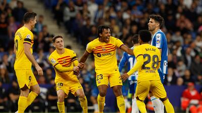 Barcelona's Jules Kounde celebrates scoring their fourth goal with Robert Lewandowski, Gavi and Alex Balde. Reuters