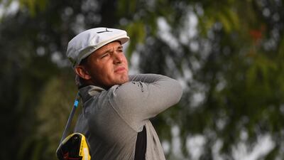 Bryson Dechambeau tees off at the 10th hole at the Omega Dubai Desert Classic. EPA
