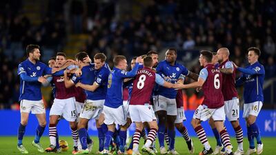Ciaran Clark, No 6, of Aston Villa and Matthew James, No 8, of Leicester City clash following a rash tackle on Jores Okore of Aston Villa during their Premier League match at the King Power Stadium on Saturday. Leicester won the match 1-0. Shaun Botterill / Getty Images