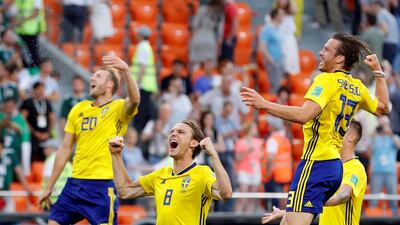Sweden players celebrate after beating Mexico and securing their place in the World Cup last-16. Darren Staples / Reuters