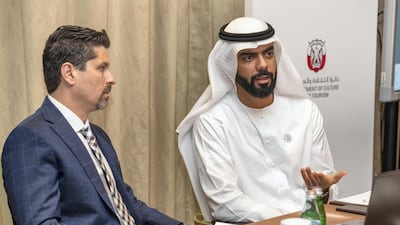 Jonathan Edelheit, chief executive of the Medical Tourism Association and Saif Saeed Ghobash, Undersecretary of the Department of Culture and Tourism Abu Dhabi, discuss plans to increase medical tourism numbers in the emirate. Antonie Robertson/The National