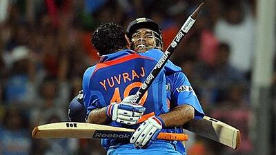 Yuvraj Singh congratulates captain MS Dhoni after India win the World Cup.