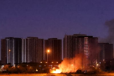 A fire burns outside the grounds of the US Embassy in Baghdad following Tuesday's drone and rocket attack. AFP