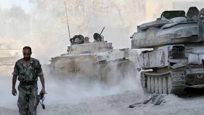A Syrian soldier in the Jobar neighborhood of Damascus. Syrian regime forces have not returned to the bases they fled last week when a missile attack was thought to be imminent.
