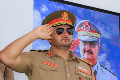 Saddam Haftar attends a military parade in Benghazi. AFP