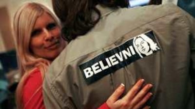 Kadima party supporters monitor the Israeli polls at party headquarters in Tel Aviv.