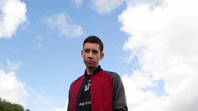 Example, pictured here beside the Thames in London, says fatherhood has changed his music.