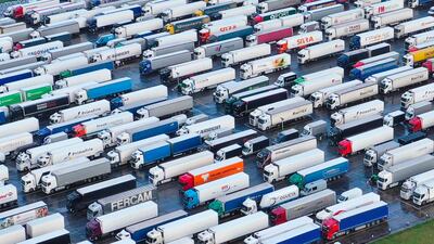 Freight Lorries and heavy goods vehicles (HGVs) are stacked at Manston Airport near Ramsgate, south east England where freight transport was diverted to wait, after France closed its borders for 48 hours to contain the spread of new strain of coronavirus. Europe on Wednesday began lifting travel bans on Britain put in place to contain a new fast-spreading Covid strain while WHO experts were set to meet on a response to it. Britain announced on Tuesday it had reached an agreement with France to allow lorry drivers stranded in the UK following the closure of the border to leave, provided they take a lateral flow Covid-19 test. AFP