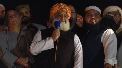 JUI leader Maulana Fazlur Rehman delivers a speech on the third day of the march. AFP