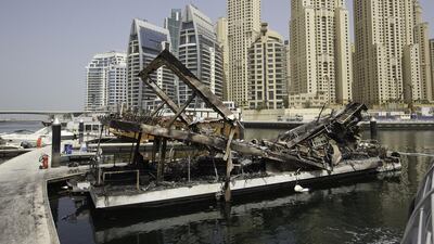 The restaurant boat after a fire at Dubai Marina Promenade. Jaime Puebla / The National