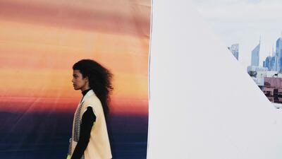 Dress, Dh6,175; top, Dh6,460; and Tabi shoes, Dh3,000, Maison Margiela