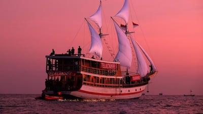 A pinisi boat transporting the 2018 Asian Games flame while enroute to Bira beach for the torch relay in Tana Beru. Yusuf Wahil/AFP