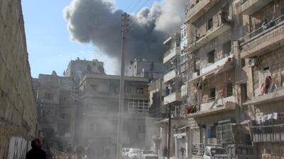Smoke billows from a regim airstrike in the northern Syrian city of Aleppo on Friday. Nearly 1,900 people have been killed in Syria while peace talks were held in Switzerland from January 22, the Syrian Observatory for Human Rights said. Medo Halab / AFP