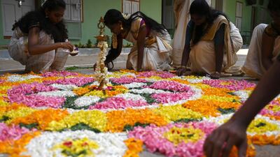 Children prepare a floral rangoli, a decorative design made on the occasion of festivals, as part of the Onam festival celebrations at a school in Chennai on August 30. Onam is one of the most important festivals in the southern coastal state in Kerala and is celebrated for 10 days by all religious communities. AFP