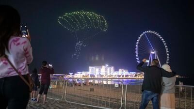 About 300 drones light up Dubai's night sky to mark the shopping festival. Antonie Robertson / The National