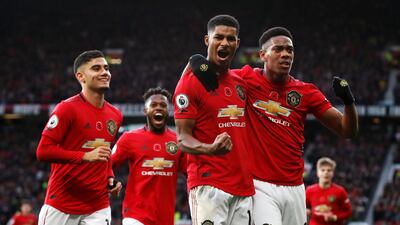Manchester United's Marcus Rashford, second right, celebrates scoring his side's third goal in their Premier League win against Brighton in October. PA