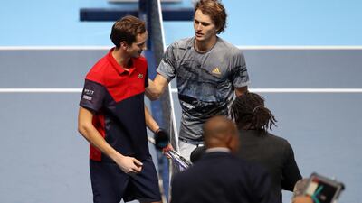 Alexander Zverev of Germany and Daniil Medvedev of Russia embrace at the net after their singles match at the ATP World Tour Finals. Zverez plays Dominic Thiem in the semi-finals. Getty