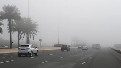 Sheikh Khalifa Highway engulfed by fog. Ravindranath K / The National