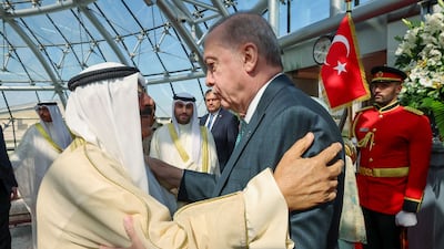 Kuwaiti Emir Sheikh Meshal welcomes Turkey's President Recep Tayyip Erdogan in Kuwait City. Turkish Presidency Press Office / AFP