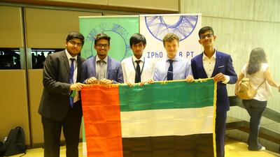 Edward Garemo, second from right, from a team of five UAE pupils that travelled to the International Physics Olympiad in Lisbon won the country's first bronze medal. Credit: International Olympiad Foundation UAE