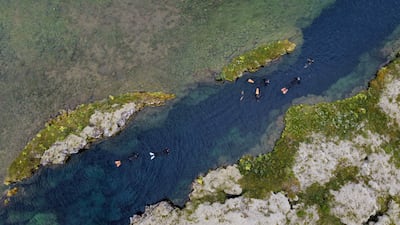 An aerial view shows tourists in the main Silfra fissure, which is approximately 300 meters long. AFP