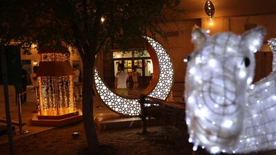 Ramadan decorations at Al Seef market in Dubai include the traditional crescent and fanous. EPA