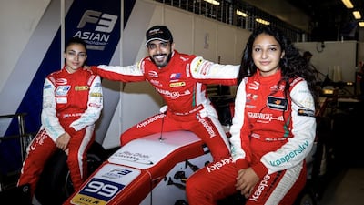 Khaled Al Qubaisi with Amna (left) and Hamda. Courtesy Khaled Al Qubaisi