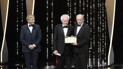 Viggo Mortensen looks as Jean-Pierre Dardenne and Luc Dardenne receive the Best Director Award for their film Le Jeune Ahmed at the Closing Ceremony during the 72nd annual Cannes Film Festival on May 25, 2019 in Cannes, France. Getty Images