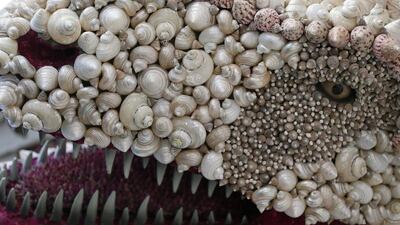 A dinosaur made from shells. Reuters