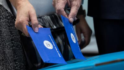 Benny Gantz, former Israeli Army Chief of Staff and chairman of the Blue and White Israeli centrist political party, casts his vote alongside his wife Revital during the Israeli general election, in his hometown. EPA