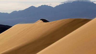 Above, the Singing Sands, a dune formation that generates a low-pitched, organ-like sound in dry weather. Shamil Zhumatov / Reuters