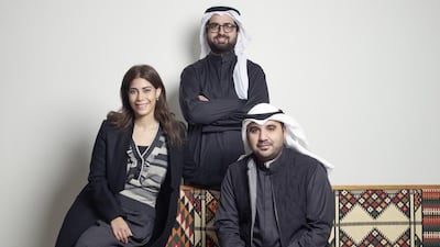 Ahmad Salamah, centre, his wife Latifa Al Sultan, and Ali Al Awadi, the co-founder of Bilbayt.com, took advantage of the trend for home catering among Kuwaitis. Courtesy Ahmad Salamah