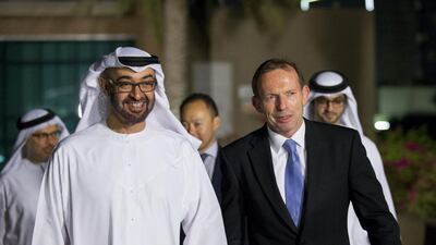 Sheikh Mohammed bin Zayed, Crown Prince of Abu Dhabi and Deputy Supreme Commander of the Armed Forces, hosted a dinner in honour of Tony Abbott, the prime minister of Australia. Also present were Dr Anwar Gargash, Minister of State for Foreign Affairs, back left, and Sheikh Sultan bin Hamdan bin Zayed, back right. Ryan Carter / Crown Prince Court – Abu Dhabi