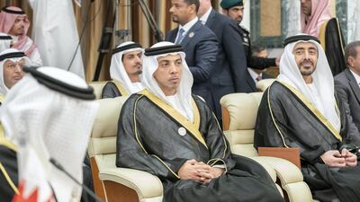Sheikh Mansour and Sheikh Abdullah look on.