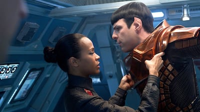 Zoe Saldana, left, as Uhura and Zachary Quinto as Spock in a scene in the movie, Star Trek Into Darkness. Paramount Pictures, Zade Rosenthal / AP Photo
