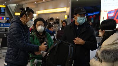 People at Heathrow Airport after arriving on a flight from Shanghai. Getty