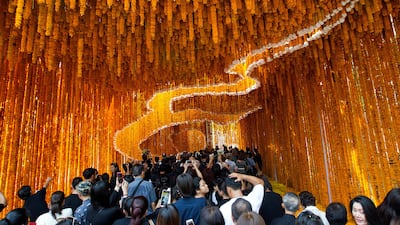Thai and foreign people visit the 'Flowers for Father' exhibition at the flower market in Bangkok, Thailand. Pongmanat Tasiri / EPA