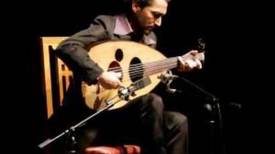 "After the great buildings and streets that have been built, after this rich life that has been built, we need to build cultural life": Naseer Shamma at the Syrian Opera House in Damascus, performing at a concert for refugees from Iraq.