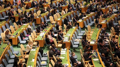 Delegates listen to French President Emmanuel Macron (unseen) as he adresses the UN General Assembly at the UN headquarters in New York. AFP