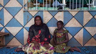 Oumou Ndiaye, 30, and her daughter Aissata Golfa, 9, in their house in Bamako. Oumou, who is a housewife, did not go to school. As a child she hoped to marry a local businessman. She hopes her daughter will marry someone from their ethnic group, and that she will remain in school until she is 20 years old. Aissata says that she will finish school when she is 18, and hopes to be a schoolteacher. Joe Penney / Reuters
