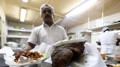 Staff serve customers during the evening.