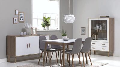 Gammelgab table, Dh1,000, and Jonstrup chairs, Dh200 each