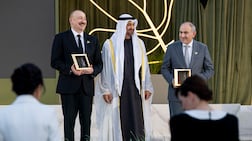 President Sheikh Mohamed presents the Zayed Award For Human Fraternity to Nikol Pashinyan, Prime Minister of Armenia, right, and Ilham Aliyev, President of Azerbaijan, for the Armenia-Azerbaijan Peace Agreement, during the Zayed Award For Human Fraternity 2026, at the Founders Memorial in Abu Dhabi. Photo: UAE Presidential Court