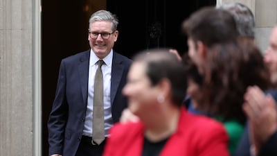 British Prime Minister Keir Starmer is greeted by Scottish MPs outside No 10 Downing Street after a cabinet meeting, in London, on July 9. EPA
